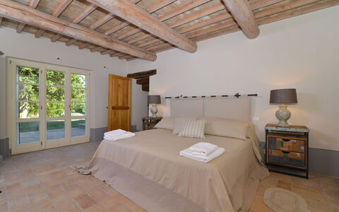 Villa Il Troscione: Furniture, Bed, Interior Design, Bedroom, Flooring, Wood, Floor, Bedding, Bed Sheet, Home