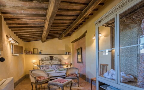 Prugnolo: Furniture, Wall, Interior Design, Flooring, Floor, Ceiling, Bedroom, Lighting, Bed, Room