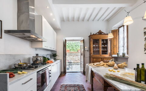 Villa Cerreta: Kitchen, Furniture, Home, Countertop, Flooring, Interior Design, Kitchen Appliance, House, Home Appliance, Lighting