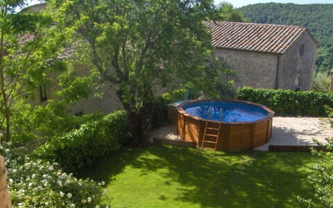 Borgo di Fighine: Shrub, Garden, Swimming Pool, Backyard, Leisure, Landscaping, Yard, Eco Hotel, Outdoor Furniture, Courtyard