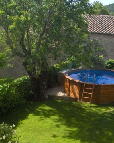 Borgo di Fighine: Shrub, Garden, Swimming Pool, Backyard, Leisure, Landscaping, Yard, Eco Hotel, Outdoor Furniture, Courtyard