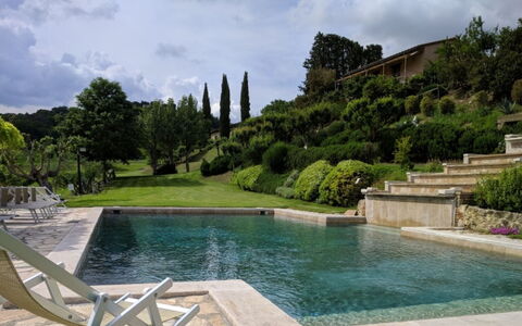 Podere della Bruciata: Swimming Pool, Garden, Water Feature, Landscaping, Flagstone, Backyard, Resort, Evergreen, Yard