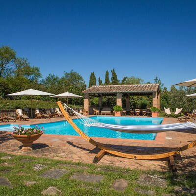 Villa Giuncheto: Resort, Swimming Pool, Shade, Outdoor Furniture, Estate, Eco Hotel, Hacienda, Sunlounger, Landscaping, Garden