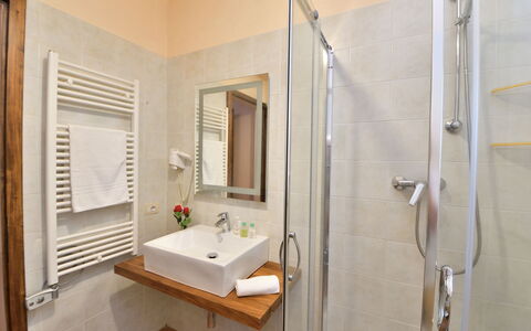 Bellaria: Interior Design, Flooring, Furniture, Floor, Wood, Plumbing Fixture, Room, Bathroom, Sink, Tap