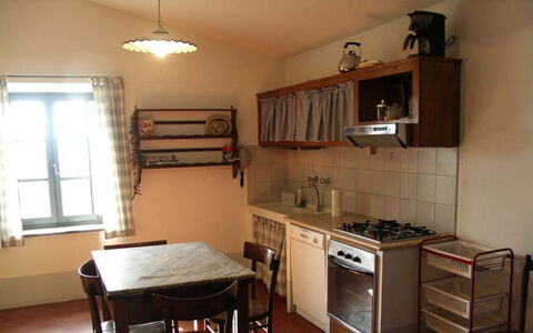 Vallocchie: Furniture, Flooring, Wood, Interior Design, Floor, Room, Ceiling, Lighting, Kitchen, Major Appliance