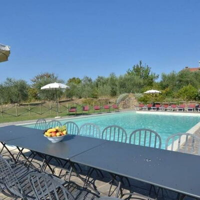 Villa Il Poggio: Furniture, Outdoor Furniture, Table, Chair, Outdoor Table, Lawn, Landscaping, Yard, Swimming Pool, Resort