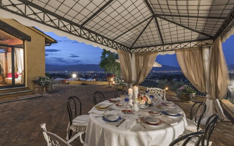 Villa Lucente: Chair, Villa, Outdoor Structure, Eco Hotel, Balcony, Hotel, Courtyard, Houseplant, Hacienda, Canopy