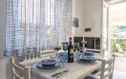 Casa Liliana Ac, Wifi, Forte Dei Marmi: Furniture, Interior Design, Textile, Table, Chair, Dining Room, Flooring, Kitchen & Dining Room Table, Linens, Room