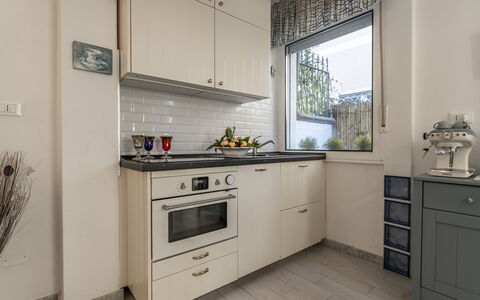 Casa Liliana Ac, Wifi, Forte Dei Marmi: Kitchen, Kitchen Appliance, Countertop, Cabinetry, Major Appliance, Interior Design, Kitchen Stove, Wood, Home Appliance, Flooring