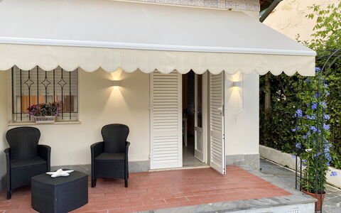 Casa Liliana Ac, Wifi, Forte Dei Marmi: Awning, Door, Flowerpot, Shade, Outdoor Structure, Houseplant, Balcony, Porch, Outdoor Furniture, Canopy