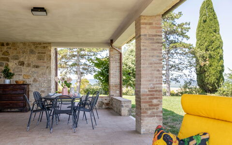 Poggio Padule: Furniture, Chair, Outdoor Furniture, Shade, Couch, Wood Stain, Porch, Living Room, Landscaping