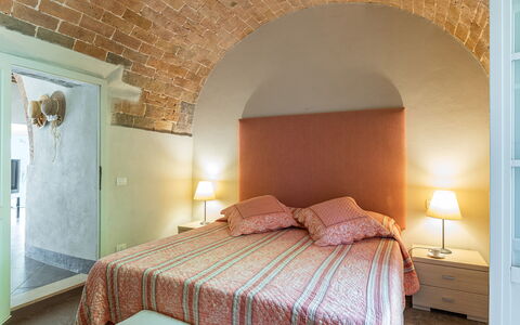 Villa Linchiano: Furniture, Wall, Bedroom, Bed, Interior Design, Bed Sheet, Bedding, Ceiling, Floor, Flooring
