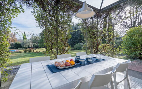 Il Villino Del Collezionista With Pool In Pistoia: Furniture, Table, Kitchen & Dining Room Table, Chair, Outdoor Table, Outdoor Furniture, Shade, Garden, Restaurant, Glass