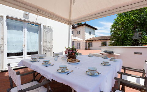Villa Yvonne: Home, Furniture, Door, Chair, Balcony, Houseplant, Kitchen & Dining Room Table, Flowerpot, Villa, Outdoor Structure