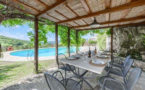 Villa Poggio La Croce: Furniture, Outdoor Furniture, Chair, Swimming Pool, Outdoor Table, Resort, Flagstone, Eco Hotel, Shade, Kitchen & Dining Room Table