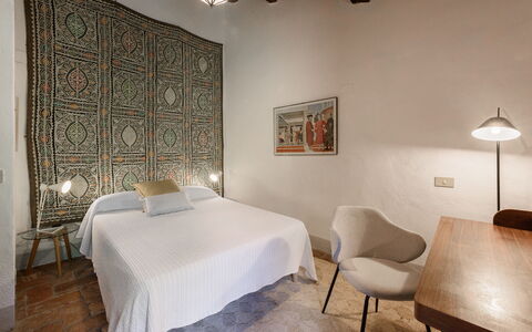 Villa Poggio La Croce: Wall, Interior Design, Flooring, Floor, Ceiling, Bedroom, Lighting, Room, Bed, Bed Sheet