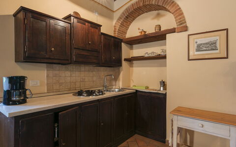 Villa Gelsi: Countertop, Kitchen, Kitchen Appliance, Cabinetry, Wood, Interior Design, Flooring, Furniture, Major Appliance, Floor