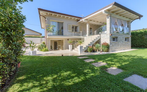 Villa Fiumetto: Building, House, Residential Area, Home, Facade, Roof, Architecture, Estate, Cottage