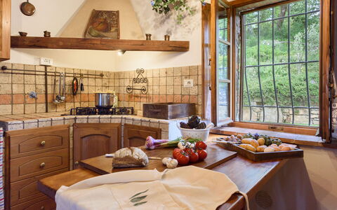 Villa Tregole: Kitchen, Interior Design, Wood, Furniture, Flooring, Countertop, Room, Cabinetry, Ceiling, Floor