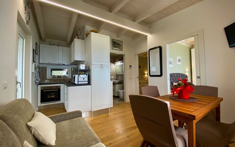 Il Tramonto: Interior Design, Flooring, Floor, Ceiling, Room, Furniture, Couch, Living Room, Hardwood, Wood Flooring