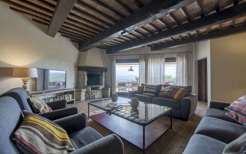 Villa delle Rose: Furniture, Wall, Interior Design, Flooring, Floor, Home, Room, Couch, Ceiling, Living Room