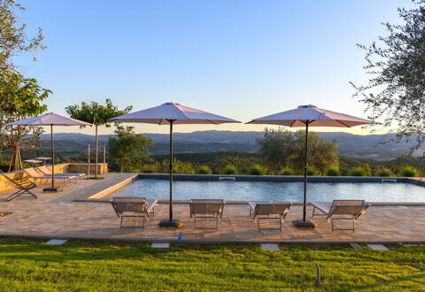 Podere Vigna Nuova: Sky, Tree, Swimming Pool, Outdoor Furniture, Sunlounger, Resort, Umbrella, Eco Hotel, Landscaping, Resort Town