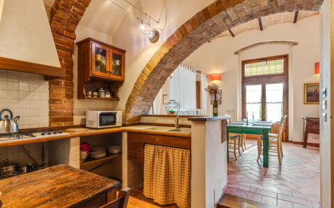 Podere Oliveta: Furniture, Interior Design, Wall, Flooring, Wood, Kitchen, Ceiling, Countertop, Chair, Table