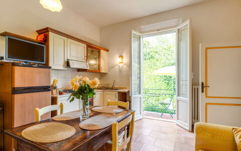 Podere Oliveta: Furniture, Interior Design, Door, Chair, Kitchen & Dining Room Table, Dining Room, Houseplant, Wood Stain, Hardwood