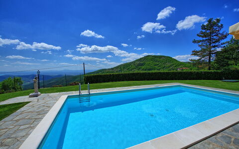 Villa Portole Due: Blue, Swimming Pool, Hill, Composite Material, Mountain Range, Resort, Eco Hotel, Shade, Ridge, Water Feature