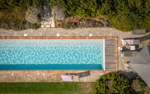 Villa Olivo: Blue, Water, Swimming Pool, Composite Material, Water Feature, Resort, Shade, Landscaping, Eco Hotel