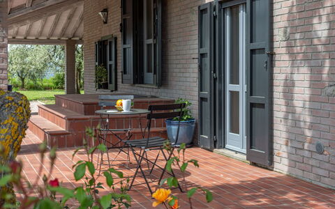 Il Querceto: Wood, Door, Home, Brick, Porch, Flowerpot, Home Door, Outdoor Furniture, Hardwood, Wood Stain