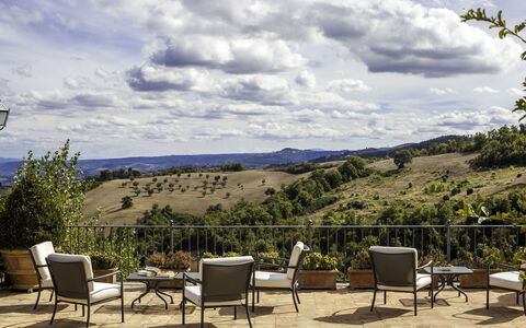 Podere Bella Vista: Furniture, Outdoor Furniture, Landscape, Chair, Land Lot, Outdoor Table, Shade, Landscaping, Patio, Eco Hotel