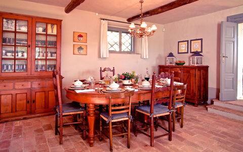 Villa Sagrantino: Furniture, Interior Design, Table, Chair, Wood, Dining Room, Flooring, Kitchen & Dining Room Table, Room, Cabinetry