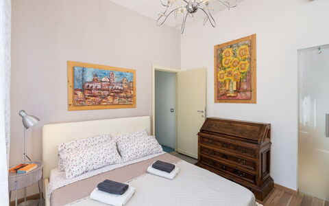 Casamia Sky-High Panoramic Retreat: Penthouse with: Furniture, Interior Design, Bed, Wall, Bedroom, Flooring, Floor, Wood, Room, Ceiling