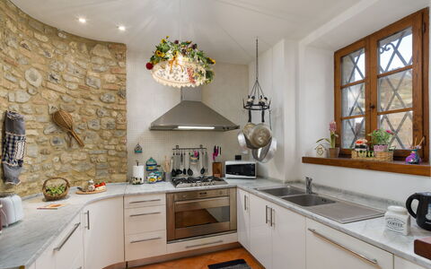 Capanna Al Lago: Kitchen, Interior Design, Countertop, Furniture, Wall, Flooring, Light Fixture, Ceiling, Kitchen Appliance, Home