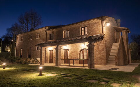 Villa Cortona: Eco-Sustainable Luxury Estate with: Wall, Building, Architecture, Facade, Home, Residential Area, House, Estate, Brick, Mansion