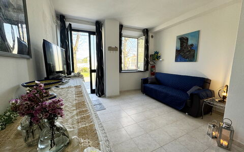 Il Volo Del Nibbio: Interior Design, Floor, Flooring, Furniture, Apartment, Room, Living Room, Couch, Curtain