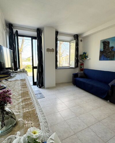 Il Volo Del Nibbio: Interior Design, Floor, Flooring, Furniture, Apartment, Room, Living Room, Couch, Curtain
