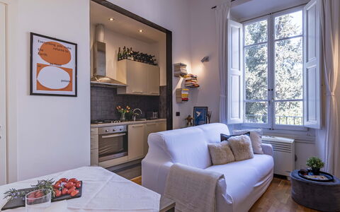 Green Suite Florence: Furniture, Interior Design, Wall, Flooring, Room, Couch, Wood, Ceiling, Living Room, Floor