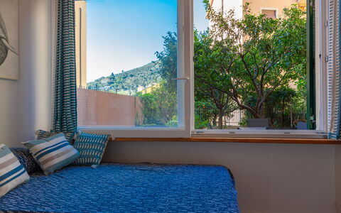 La Casa Dei Mandarini: Interior Design, Furniture, Room, Apartment, Linens, Wood Stain, Bedroom, Window Treatment, Shade, Pillow