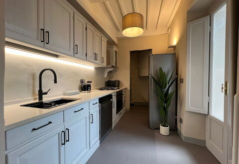 Via Roma 39: Kitchen, Countertop, Kitchen Appliance, Cabinetry, Interior Design, Major Appliance, Furniture, Flooring, Wood, Kitchen Stove