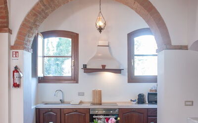 Appartamento Irpina: Furniture, Interior Design, Ceiling, Light Fixture, Lighting, Arch, Flooring, Table, Home, Kitchen