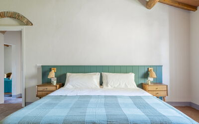 Relais Badia a Passignano - Appartamento Merlot: Furniture, Bed, Interior Design, Bedroom, Bedding, Bed Sheet, Wood, Linens, Flooring, Floor