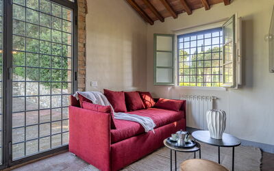 Relais Badia a Passignano - Appartamento Vermentin: Furniture, Interior Design, Wall, Flooring, Couch, Floor, Wood, Home, Living Room, Room