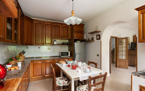 Villa Fornaci: Furniture, Kitchen, Interior Design, Countertop, Cabinetry, Kitchen Appliance, Wood, Flooring, Ceiling, Room