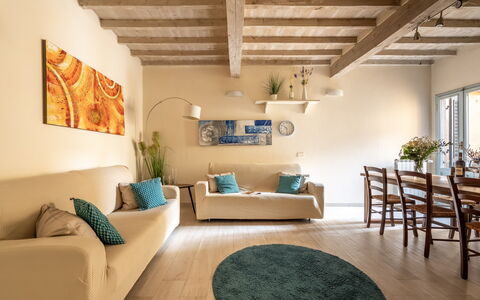 San Cristofano Blu Apartment Santa Croce, Florence: Furniture, Interior Design, Flooring, Couch, Wall, Floor, Wood, Room, Ceiling, Living Room