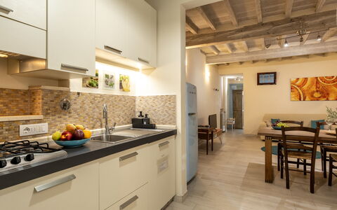San Cristofano Blu Apartment Santa Croce, Florence: Interior Design, Furniture, Flooring, Countertop, Kitchen, Wood, Ceiling, Floor, Major Appliance, Kitchen Appliance