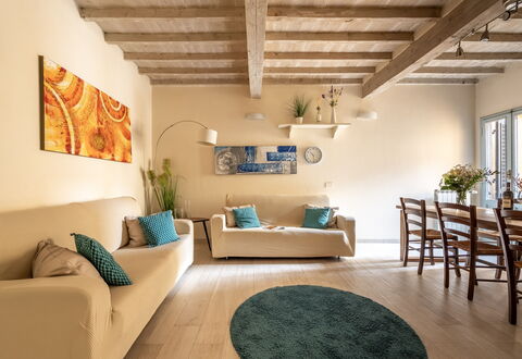 San Cristofano Blu Apartment Santa Croce, Florence: Furniture, Interior Design, Flooring, Couch, Wall, Floor, Wood, Room, Ceiling, Living Room