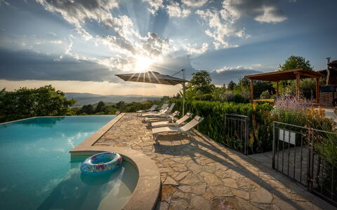 Casale Sunset: Swimming Pool, Landscape, Sunlight, Eco Hotel, Resort, Outdoor Furniture, Leisure, Landscaping, Evening, Umbrella