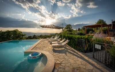 Casale Sunset: Swimming Pool, Landscape, Sunlight, Eco Hotel, Resort, Outdoor Furniture, Leisure, Landscaping, Evening, Umbrella